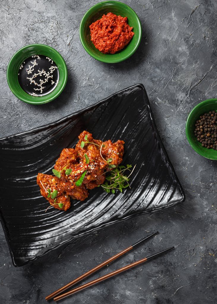Delicious spicy Korean chicken dish served with soy sauce & gochujang. Perfect for swicy glaze recipes